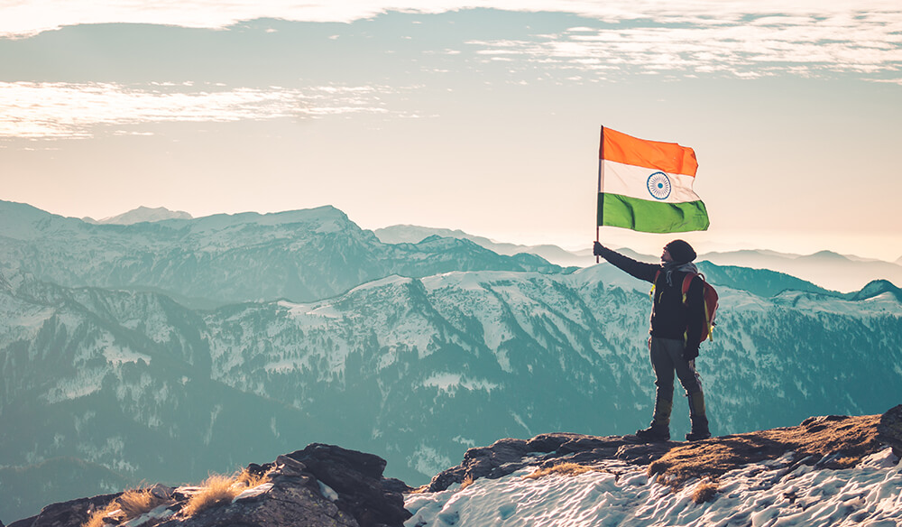 Kedarkantha Trek - Man Holding Indian Flag
